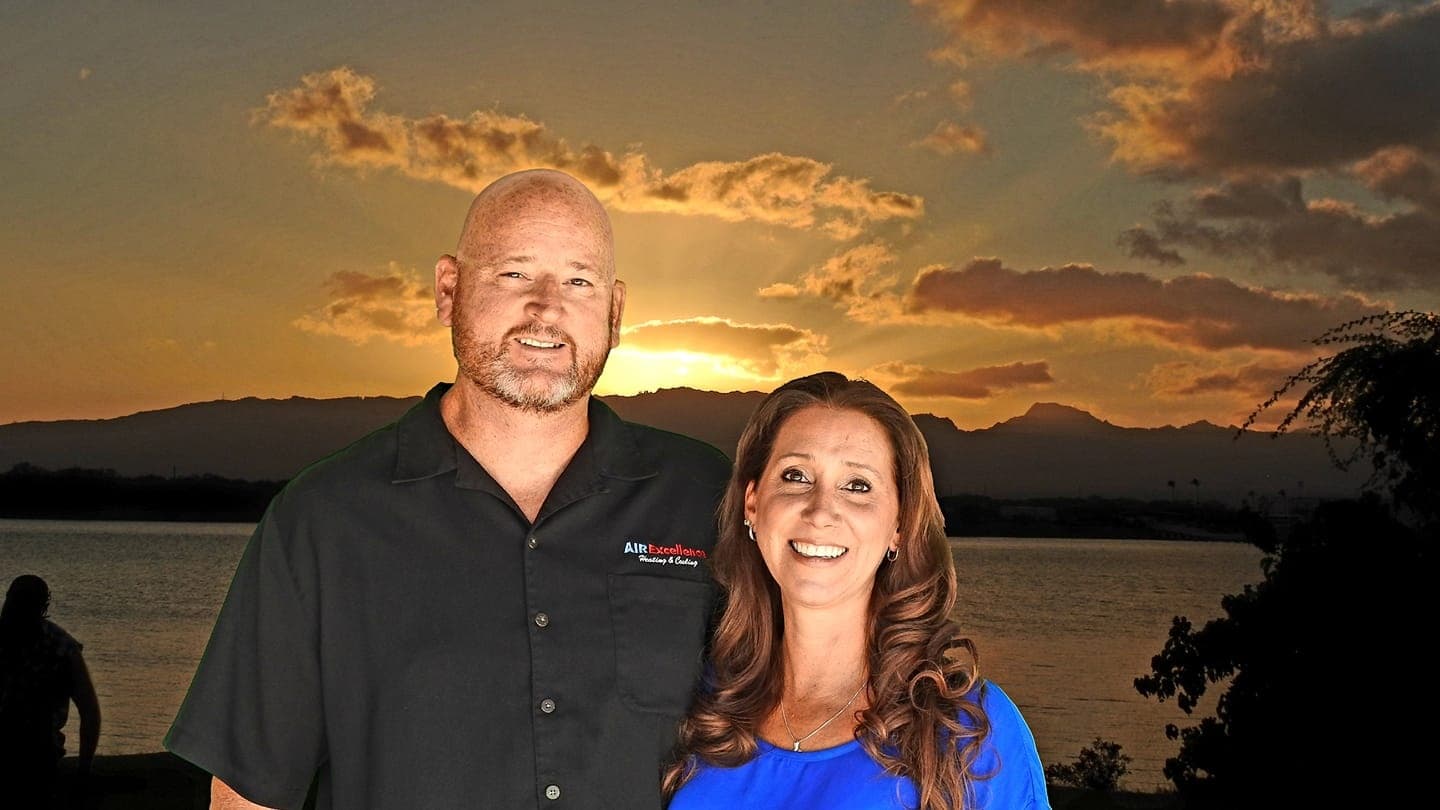 Air Excellence owners Mike and Amy at sunset over a Southern Arizona lake